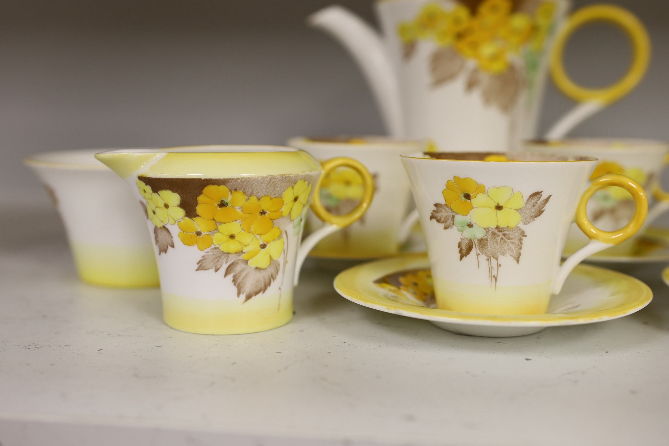 A Shelley “Yellow Phlox”, part tea service, one cup missing and one cup cracked